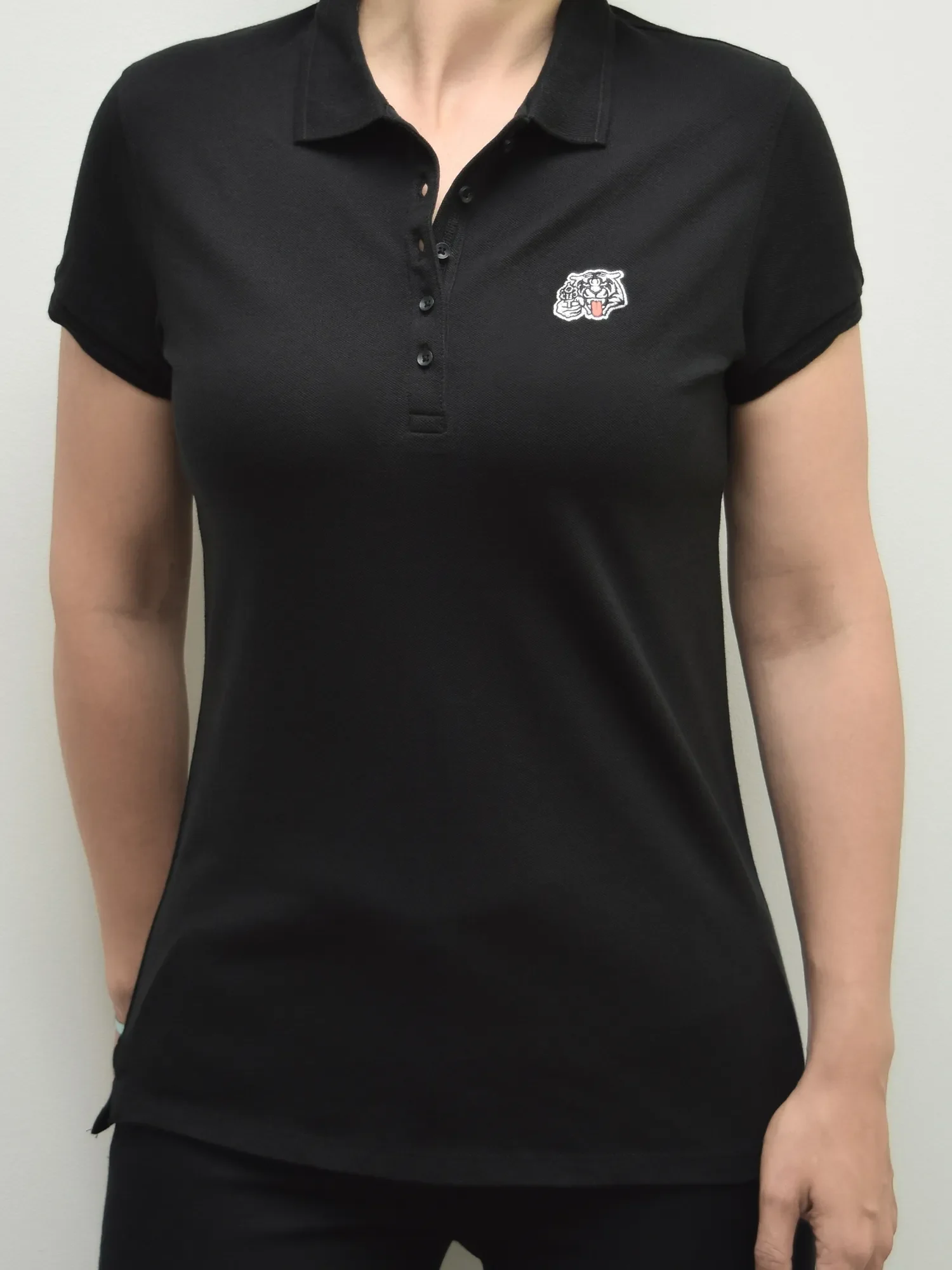 dames tijger polo zwart